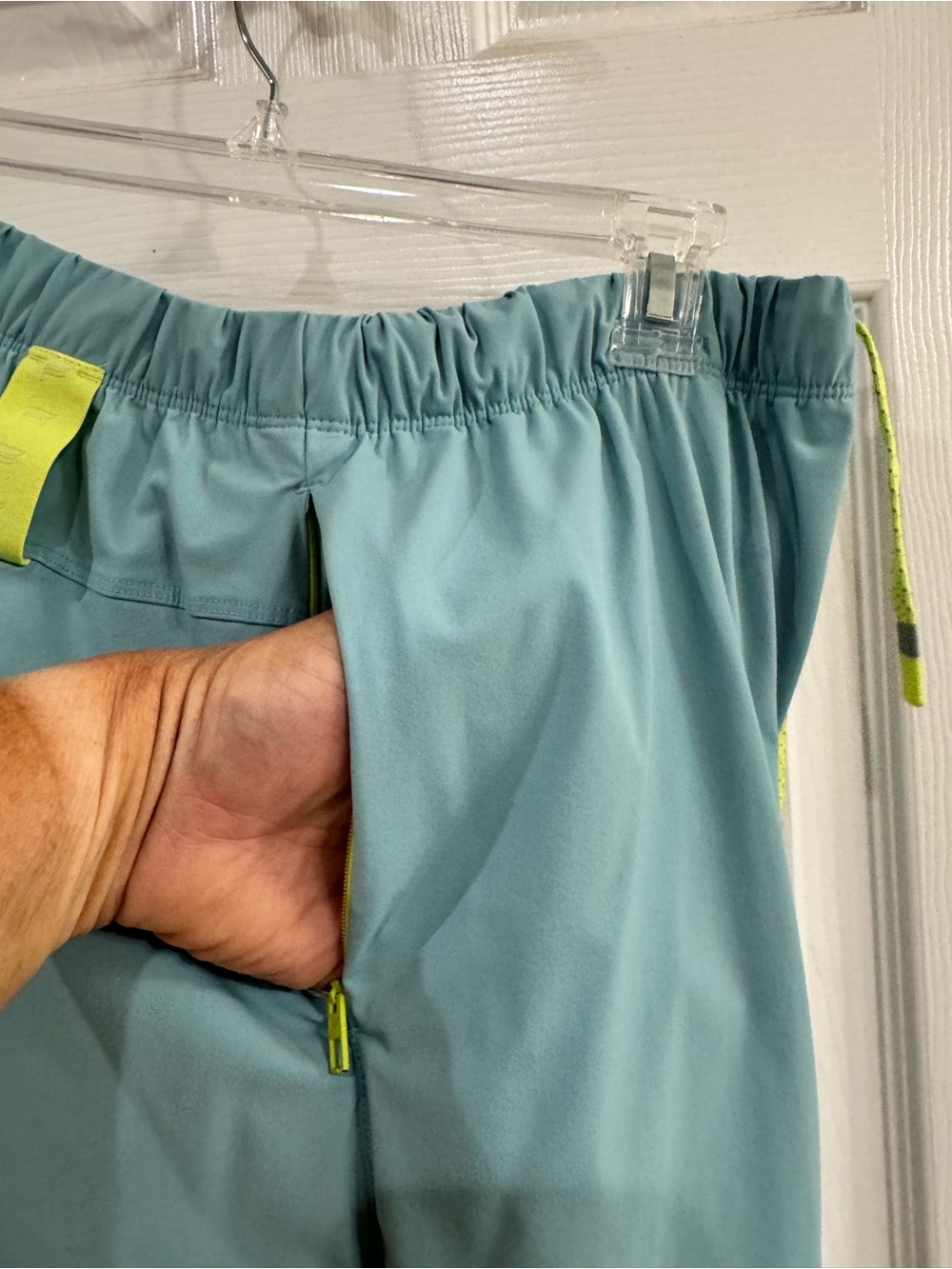 Fabletics Light Teal Athletic Shorts with Neon Yellow Accents - Picture 4 of 9